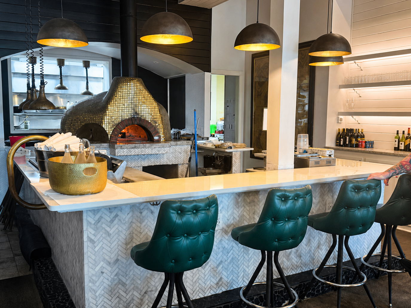 Pizza bar in front of the wood-fired oven at Romacelli