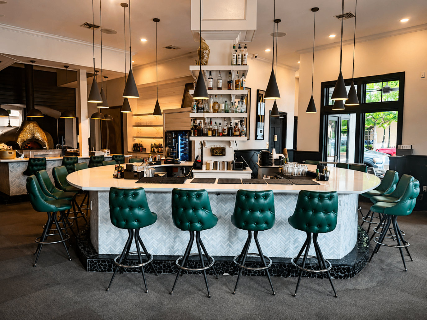 Full view of the horseshoe bar at Romacelli in Lafayette
