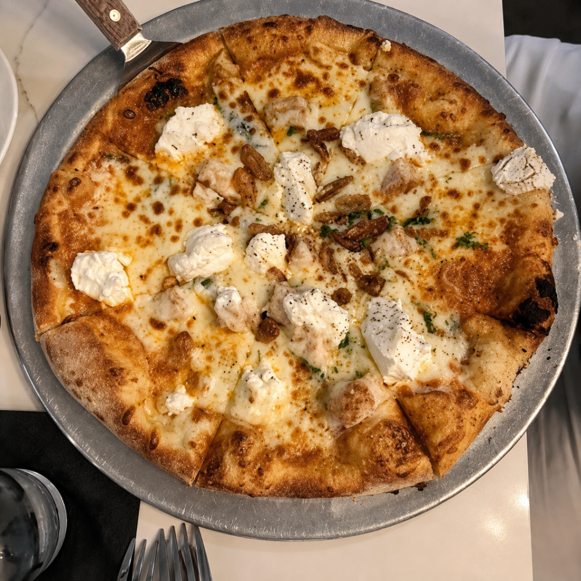 White pizza with ricotta and chicken at Romacelli